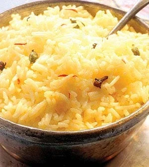 recipe for cooking rice with the taste of cardamom cloves and saffron, rice with the taste of cardamom cloves and Iranian saffron, rice with the taste of cardamom and cloves, rice with the taste of cardamom cloves and saffron, Local food with Iranian saffron, How to prepare rice with the taste of cardamom cloves and Iranian saffron, Tips For cooking rice with the taste of cardamom cloves and Iranian saffron, how to prepare different types of rice, cooking training with saffron